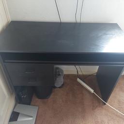 Black computer desk with slide out table and 2 draws