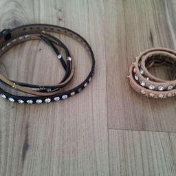 2 neuwertige Leder-Strass-Wickel-Armbänder.

1x schwarz
1x rosa

Preis versteht sich für beide zusammen.

Privatverkauf.