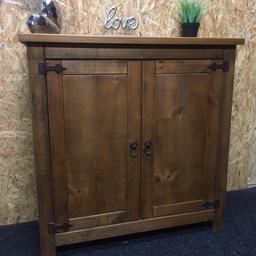 Large solid wood rustic cupboard/sideboard with storage shelf inside. Decorative metal hinges and handles. Ideal for a hallway or dining room. The unit measures 106cm wide x 43cm deep x 107cm tall. Viewing/collection is Leeds LS24 & delivery is available if required - £150