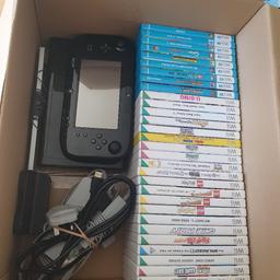 Big bundle includes the Wii U console 32gb, Wii U GamePad, charging stand for GamePad, all leads including sensor, 31 games altogether. Everything has been cleaned including discs, the console has been wiped and ready to use. The main wire coating was a bit ripped so I have duct taped it to keep it secure but still works perfect well (see picture). 
Collection only or can deliver locally. Can deliver further but will charge petrol fee.