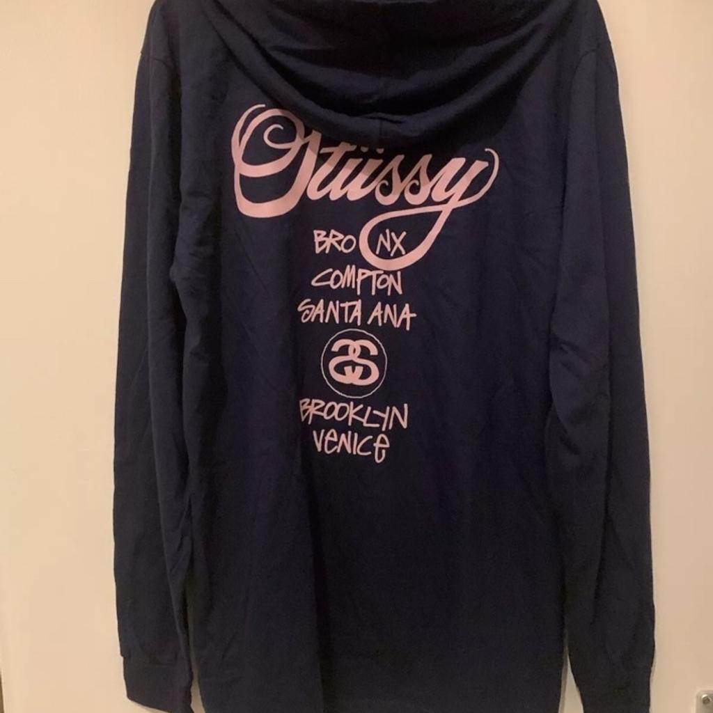 Stussy Long Sleeve Hoodie T-Shirt

In brand new condition brought from Stussy dealer but made a mistake with the size
Long sleeves and Hood
Pink emblem Front and back
 Size is Large