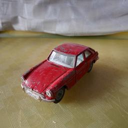 corgi mgb GT with opening doors and folding seats. played with condition can post at cost or collection from sedgley Dudley.        open to offers 