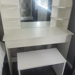 white dressing table with side shelves, mirror attached. Has pull out drawer with 2 sides. May have the odd slight mark. Seat was bought separate as this didn't originally come with one but selling as a set. £90 ono collection only thanks