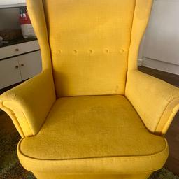 STRANDMON IKEA armchair in yellow.

Comfortable and sturdy, but requiring cleaning and a bit of TLC, hence the drastic price reduction (original price £229).

Collection only