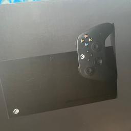 Xbox series x 1TB used a couple times comes with the box and the cable and the remote control.