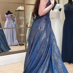 Stunning BRAND new prom dress by REINE. 

paid 400 for it but daughter never went to prom. 

corset back
crystallised embellished bodice. 
corset back so will go up a few sizes.