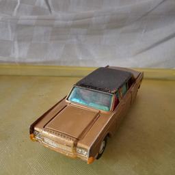 corgi Lincoln continental. with opening bonnet and boot doors. battery box is damaged. doesn't affect look of car . can post at cost or collection from sedgley Dudley.    open to offers 