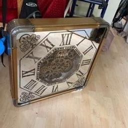 Bought but never used as I didn’t move to the house I wanted in the end. Still in box. 
The centre cogs move. 
I think it’s 60x60cm but will check.

Paid a lot of money for it a year ago!