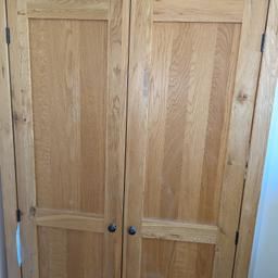 Solid wood double wardrobe with hanging rail