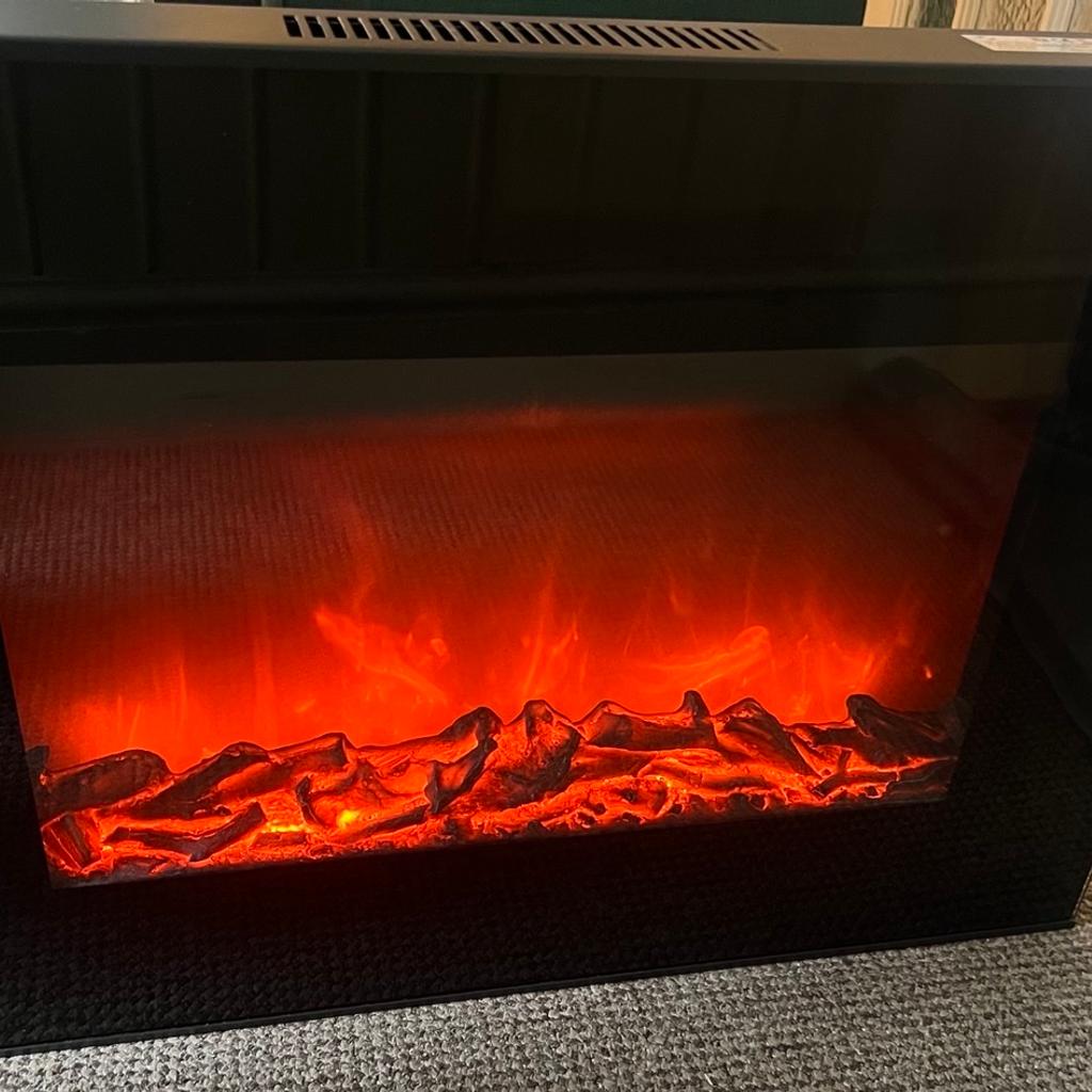 Electric fireplace. Fully working with remote. No signs of damage