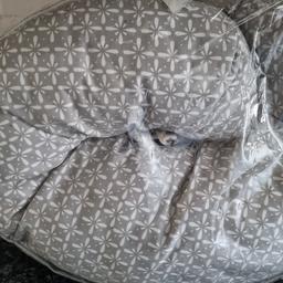wrapped around shaped nursing pillow. to be used in sitting position with 1 spare cover. having a baby toddler clearance. please checkout other items. happy to do bundle deal :). collection only.