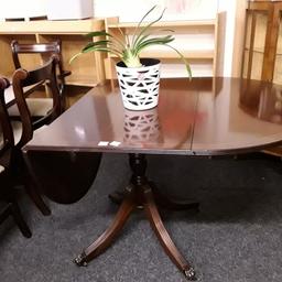SALE - Was £110 NOW £85.

This lovely lacquered mahogany drop leaf table is in good all-round used condition. Maybe some very light scratches on the surface of the wood...

Non extended - 18 inches long x 30 inches deep x 28 inches high.
1 leaf extended - 26 inches long.
Both leaves extended - 35 inches long.

Our second hand furniture mill shop is LOW COST MOVES, at St Paul's trading estate, Copley Mill, off Huddersfield Road, Stalybridge SK15 3DN... Delivery available for an extra charge.

There are some large metal gates next to St Paul's church... Go through them, bear immediate left and we are at the bottom of the slope, up from the red steps... 

If you are interested in this or any other item, please contact me on 07734 330574, or on the shop 0161 879 9365...Many thanks, Helen. 

We are OPEN Monday to Friday from 10 am - 5 pm and Saturday 10 am - 3.30 pm... CLOSED Sundays.  CLOSED Bank Holiday long weekends...