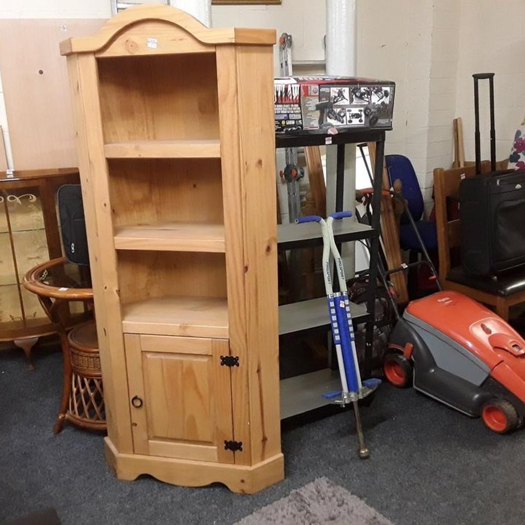 SALE - Was £95 NOW £76.

This solid Corona pine corner unit is in good all-round used condition.

30 inches wide x 15 inches deep x 69 inches high.

Our second hand furniture mill shop is LOW COST MOVES, at St Paul's trading estate, Copley Mill, off Huddersfield Road, Stalybridge SK15 3DN... Delivery available for an extra charge.

There are some large metal gates next to St Paul's church... Go through them, bear immediate left and we are at the bottom of the slope, up from the red steps...

If you are interested in this or any other item, please contact me on 07734 330574, or on the shop 0161 879 9365...Many thanks, Helen.

We are OPEN Monday to Friday from 10 am - 5 pm and Saturday 10 am - 3.30 pm... CLOSED Sundays. CLOSED Bank Holiday long weekends...