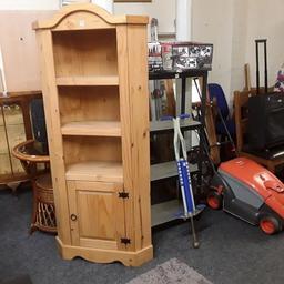 SALE - Was £95 NOW £76.

This solid Corona pine corner unit is in good all-round used condition.

30 inches wide x 15 inches deep x 69 inches high.

Our second hand furniture mill shop is LOW COST MOVES, at St Paul's trading estate, Copley Mill, off Huddersfield Road, Stalybridge SK15 3DN... Delivery available for an extra charge.

There are some large metal gates next to St Paul's church... Go through them, bear immediate left and we are at the bottom of the slope, up from the red steps... 

If you are interested in this or any other item, please contact me on 07734 330574, or on the shop 0161 879 9365...Many thanks, Helen. 

We are OPEN Monday to Friday from 10 am - 5 pm and Saturday 10 am - 3.30 pm... CLOSED Sundays.  CLOSED Bank Holiday long weekends...