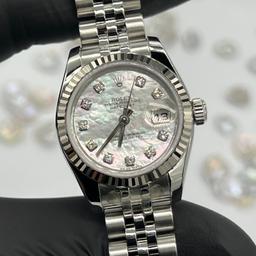 Rolex Datejust 26mm steel 

Factory diamond mother of pearl dial 
Factory White gold fluted Bezel 
Great condition 
Box and papers 
2009 
Waterproof tested
