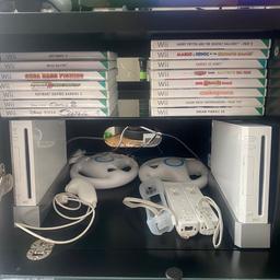 2 Nintendo Wii consoles 
2 Wii machines
2 hand controllers
2 joysticks
15 free games

Wii 2 HDMI adapter I will thrown in extra as it’s needed to work with TVs
