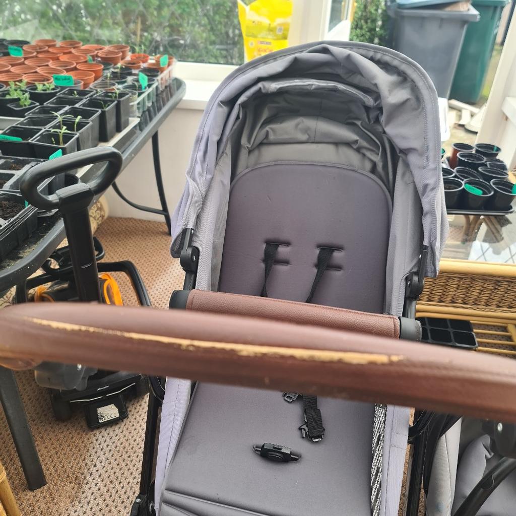 I am selling a carrycot and carseat they fit on the same frame. it has a very spacious basket. very easy to use. in good condition apart from a few scuff marks.