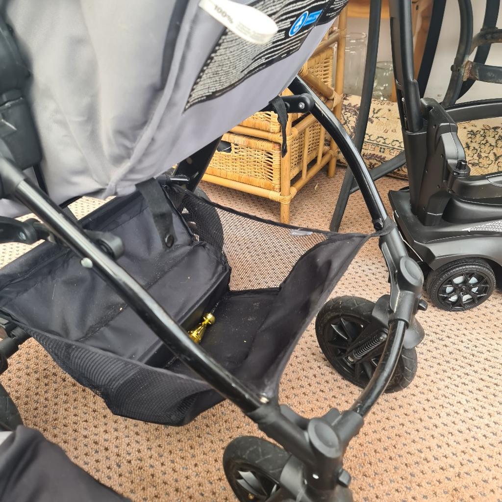 I am selling a carrycot and carseat they fit on the same frame. it has a very spacious basket. very easy to use. in good condition apart from a few scuff marks.