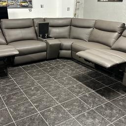 Brand New Dfs Genuine Leather Power Recliner Corner Sofa.

High quality and extremely comfortable. 

In beautiful elephant grey colour.
It has 2 power recliner seat with built in usb charging point
The sofa is sectional which makes at easy to adjust for the perfect fit.
It comes with large cupholders with storage and armrest. 
The sofa can be adjust for Left or Right hand corner.

Measurements: 290 cm x 290 cm
Cupholder 33cm

Price: £1899
RRP: £2899

Welcome to view and try in our shop. We are open 7 days a week.

Same day delivery available nationwide 🇬🇧

Also additional pieces available.

3 seater sofa + 2 seater sofa available in the same set.

Friendly Furniture
Sunnyside Business Park
Adelaide Street
BL3 3NY 

Business Mobile:

📱 07543783313

Opening times:

10:00 - 19:00 EVERY DAY 👍🏻