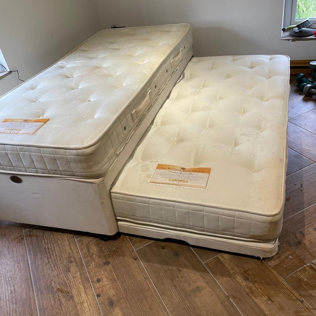 Windsor bed company. Original cost £800. Top quality pocket sprung mattresses included. Best night’s sleep.
3 in 1 - single bed, 2 singles - large king size when joined. Extra bed pulls out easily and raises up with one click at each end.
Bargain at £150