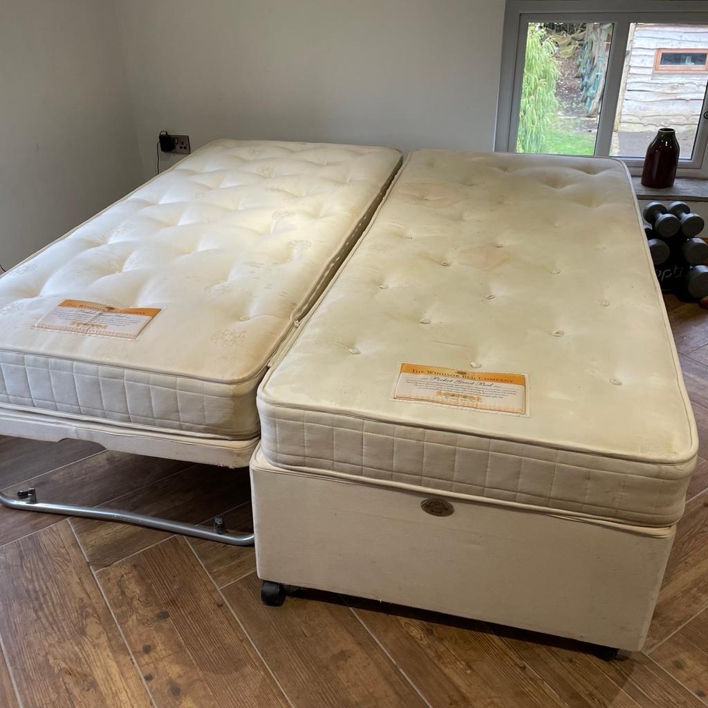 Windsor bed company. Original cost £800. Top quality pocket sprung mattresses included. Best night’s sleep.
3 in 1 - single bed, 2 singles - large king size when joined. Extra bed pulls out easily and raises up with one click at each end.
Bargain at £150