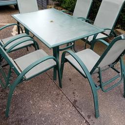 Large Garden Dining table with a glass top with 6 folding & Reclining chairs on a light green lightweight metal framework 
Length 60 inches 
Width 38 inches 
Height 27 inches 
Could do with a good clean as been kept in garden all year round as shown in pictures & some could do with a fresh coat of paint however does not affect the use of in any way and still in overall good usable condition 

Postcode for collection is bd2 4bs  - Just off Queens Road Bradford 2 area

Delivery requests will incur