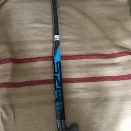 Brand new junior Slazenger hockey stick, 34 inch black/blue