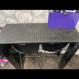 Black bar/breakfast bar with 2 chairs has lights in the shelf but but I think only 1 works bit on damage on the side (see in photos) 
£50 or nearest offers pickup from rishton