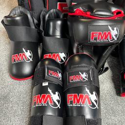 FMA Family Martial Arts Equipment & Bag. Consists of:
Bag
Head protection 
Shin guards 
Foot protection
Gloves
Pads 
Mouth guard 
Size XS
Great condition