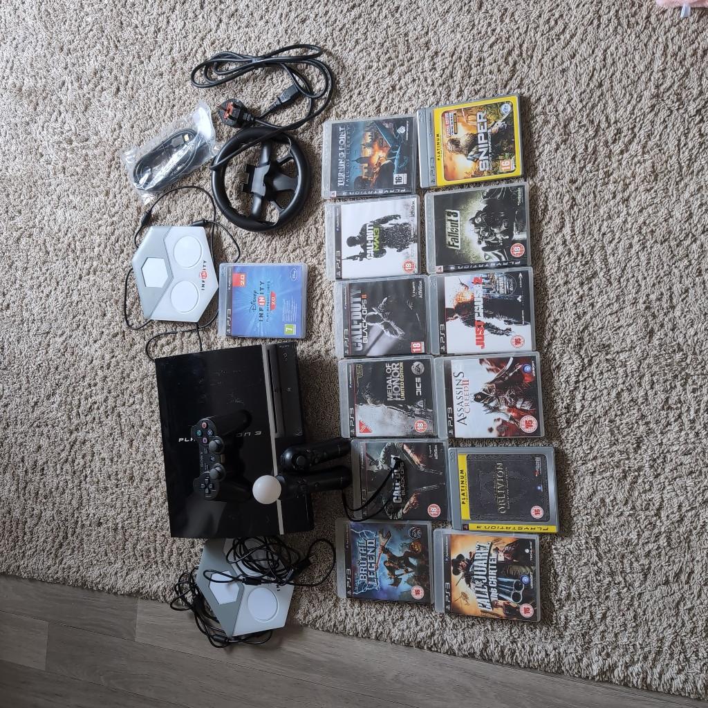 Playstation 3 bundle in great condition. Tested and all works fine. Have one controller with charging wire, two moving sticks. 13 games shown in pictures. Steering wheel and all the wires to go with it included a brand new hdmi cable. Two infinity portal bases. All works fine