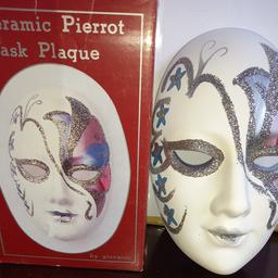 Ceramic Pierrot Mask Plaque made by Giovanni. Comes in very good condition and in original box. Minor wear to outer box due to age but item is in very good condition.

Hanging wall plaque. Glitter design.

Estimated to be produced from 1950s to 1990s.

Measures 7.5 inch from top to bottom and 5 inches in width.
