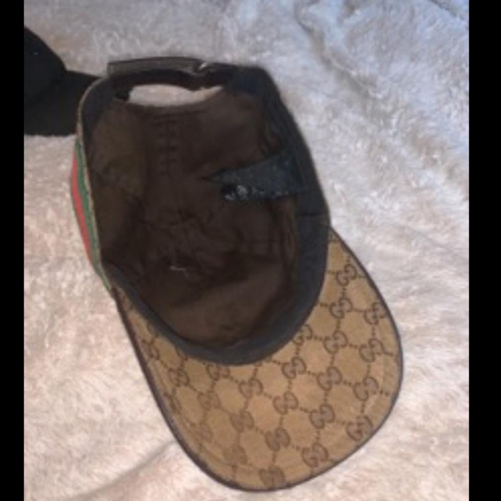 Gucci cap legit and all genuine needs a clean I don't wanna touch the material. you can see by pics looked after but is fading on the front. will deliver for fuel.