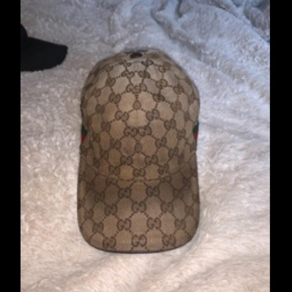 Gucci cap legit and all genuine needs a clean I don't wanna touch the material. you can see by pics looked after but is fading on the front. will deliver for fuel.