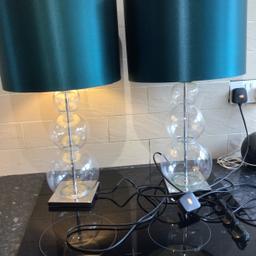 2 next glass table lamps in good condition no damage chrome stand and base like new size 23 ins Height/ from base to top of shade shade size 13 ins Width across/ 9 ins top to bottom of shade selling £25. For the pair can be seen working as in picture welcomed to view collection only please