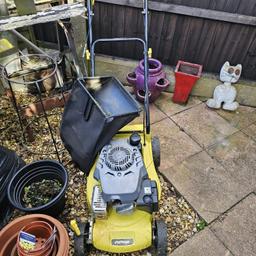 Challenge self propelled petrol lawn mower. Does work but takes a few pulls. Open to offers.