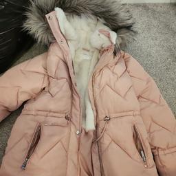 Girls pink coat from next. age 12 but comes up smaller I think. perfect condition as its never been worn