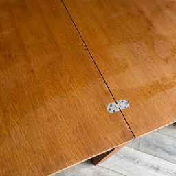 Solid oak dining table. Seats 4 normally when folded down (80cm x 80cm). Double size when opened to seat 6/8. The top of the closed table requires sanding down and oiling as it has some water marks etc but it is a solid heavy piece of furniture so it will be worthwhile for someone with DIY skills.