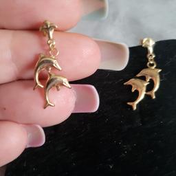 brand new 9ct gold dolphin dangle earrings postage to be covered if needed plz