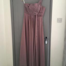 New without tags
Never worn 
Mauve colour
Fully lined
Zip back
Padded top