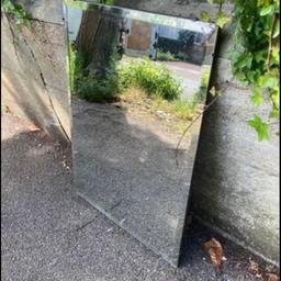 Large antique bevelled mirror  84 x 67cm

Some small damage to one bottom corner