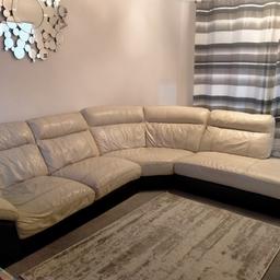 FREE TO ANYONE WHO CAN COLLECT.  Lovely light cream leather corner sofa originally from DFS. some general wear and tear that is fixable. The silver legs have been removed for easy transportation. From smoke free/pet free house. Giving away due to moving.
