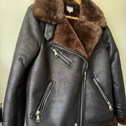 Brown ‘aviator’ style jacket. Warehouse.
Faux fur, faux leather. Size 12.
Good condition.
Collar can be worn up/down.
Warm