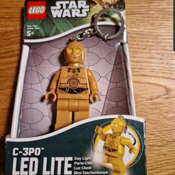 Lego Star Wars C-3P0 LED light keyring from 2013. Brand new in original packaging.