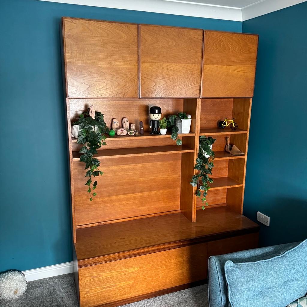 Vintage 1960s teak sideboard and display cabinet. In good condition considering its age.