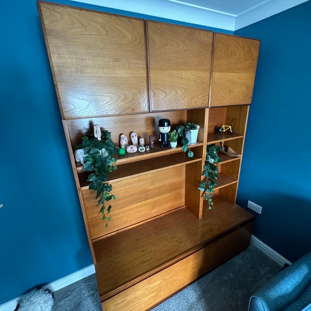 Vintage 1960s teak sideboard and display cabinet. In good condition considering its age.