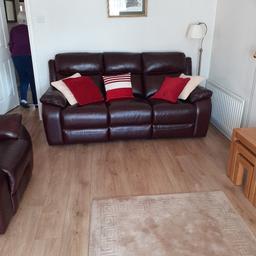 4 year old leather 3 piece suite. Sofa and one chair excellent  condition. One chair slightly damaged.