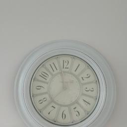 large wall clock from Dunelm.
60" x 60" 
pale grey