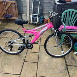 Ladies suspension mountain bike with gel seat cover and bike stand
Needs a bit of a clean and tyres pumping up. 
Collection from near Gorse Hill Primary School, Stretford. 
Open to sensible offers