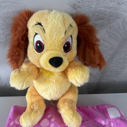 DISNEY
Disney Babies
Lady - from lady and the tramp 
Cute Plush ‘ lady’ with  reversible super soft Baby Blanket , with pink stuffed love  heart attached with L & T initials on the heart 
In good clean condition as can be seen in the photographs.
Authentic genuine Disney park’s original
Disney land Paris 
Listed on multiple sites
From a smoke free pet free home