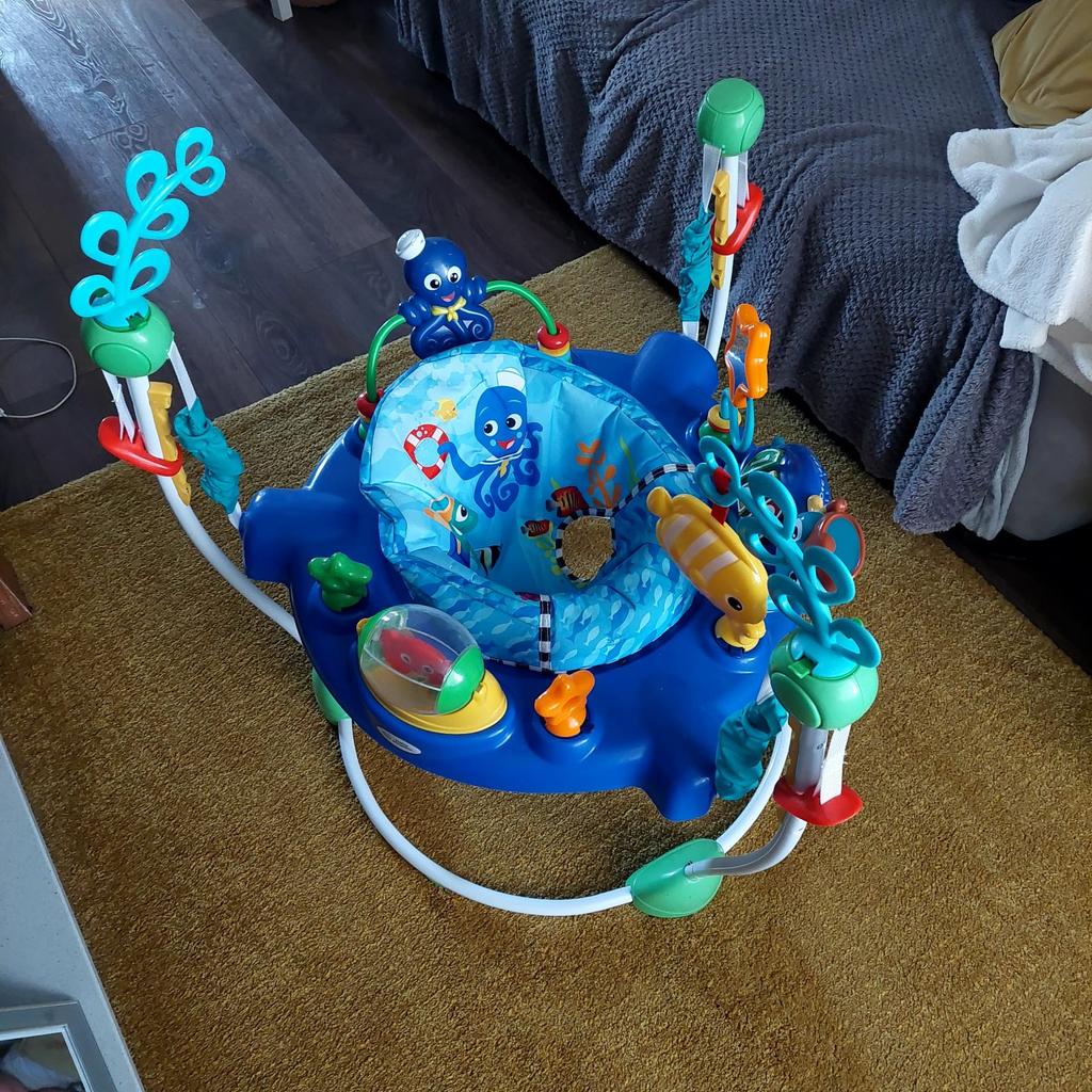 Barely used as baby didn't like being in it - missing one of the hanging toys but aside from that is in perfect condition

Bouncy seat swivels 360°
4 adjustable height positions
Electronic sea turtle station is removable
Introduces numbers & colors in English, Spanish, French
Easy to wipe down and clean - seat cover is easily removable and machine washable